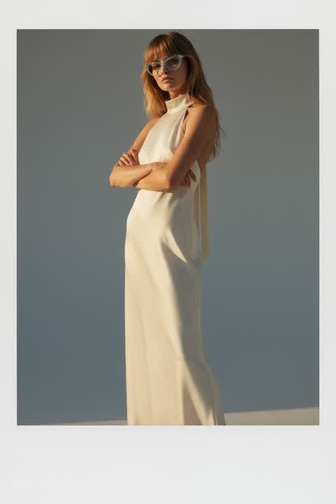 Golden Hour Glamour: High-Neck Maxi Dress & Cat-Eye Glasses